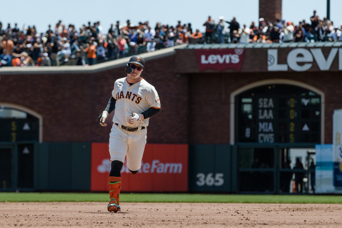 SF Giants designated hitter Joc Pederson runs the bases after hitting a two-run home run against the Chicago Cubs on June 11, 2023.